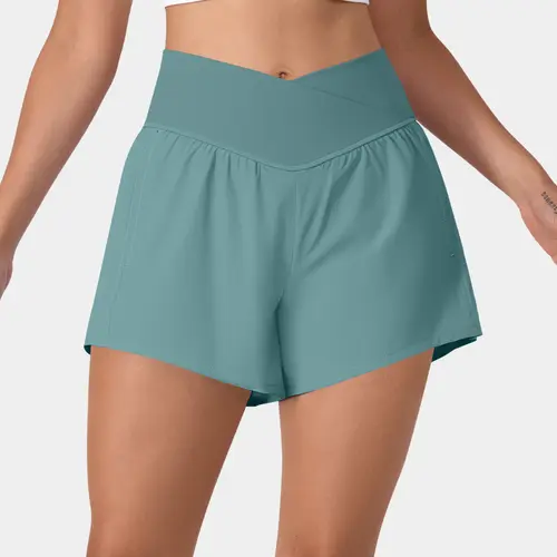 Halara Breezeful High Waisted Crossover Side Pocket 2-in-1 Quick Dry Yoga Shorts 4"