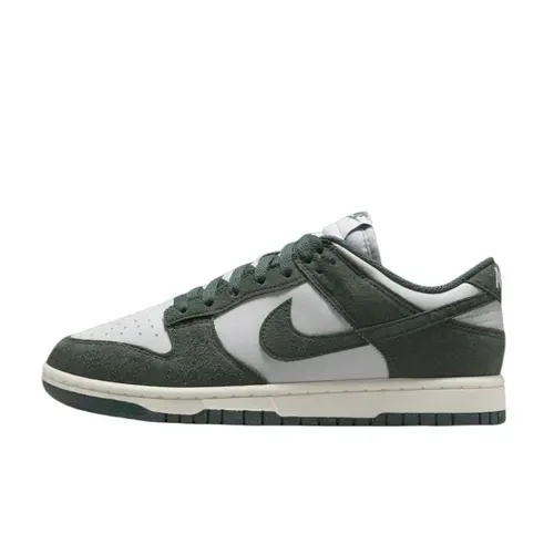 Women's Nike Dunk Low Next Nature Vintage Green Low-Cut Sneakers - Recycled Eco-Minded Construction, Heritage Design Cues, Cushioned Midsole, Durable Rubber Outsole, Colorblock Contrast Green Overlays Add Depth, Daily Casual Footwear