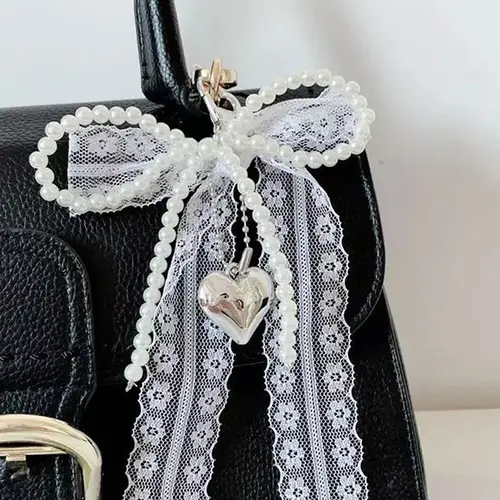 Fashionable and exquisite lace bow pendant, pearl heart-shaped pendant bag keychain pendant, sweet and cute accessories princess style, niche fashion all-match, ladies bag pendant jewelry, school bag pendant decoration, Bag Charm