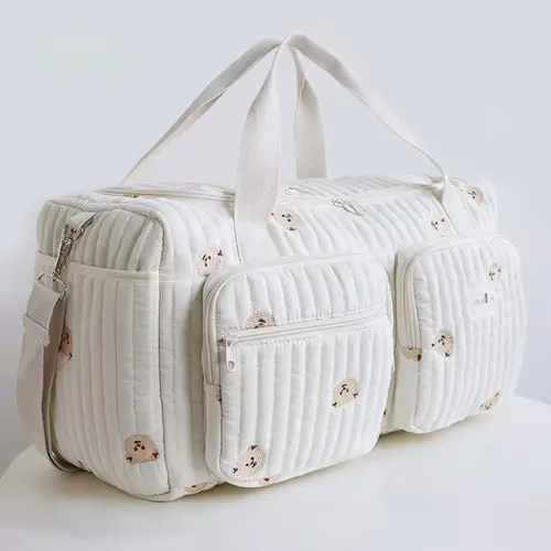 Cute bear embroidered cream white travel bag, large capacity and multiple pockets, portable crossbody gym bag, multi-compartment fashionable and exquisite crossbody bag, suitable for short trips, etc.