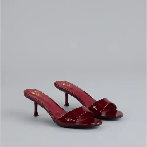 Own the Moment Patent Heeled Mules