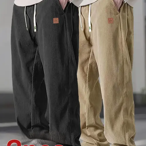 Two men's casual pants featuring a simple and versatile style with drawstring design, adding a casual feel. The pants have delicate small details, making them full of texture. The loose fit provides comfortable and relaxed wear, suitable for everyday outi