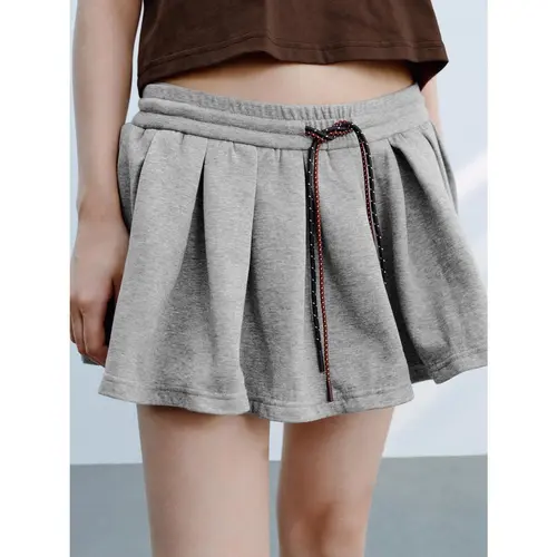 URBAN REVIVO Women's Stretch Cotton Blend Pleated A-Line Mini Skirt with Built-in Shorts, Fashionable Casual Sporty Activewear Bottoms