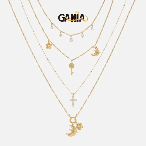 GANIA 4Pcs Layered Stackable Necklace Set,Gold & Silver Tone multi-chain pendants with moon,flower,cross and key elements. Hypoallergenic fashionable jewelry, perfect for daily wear, dating,birthdays and holiday gifts,an ideal present for women and girls.