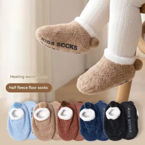 Non-slip socks (5-pair pack) — cuffs lined with warm sherpa fleece Suitable for indoor wear; low-cut design; soft coral fleece material (machine washable) Non-slip soles; heels accented with plush pom-poms