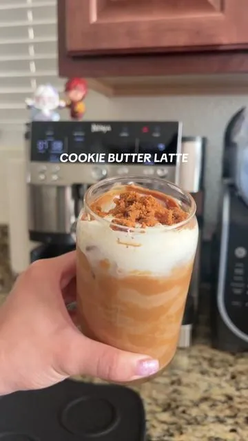 Cookie Butter Latte ☕️ What you’ll need: cookie butter, milk of your choice, espresso | optional: heavy cream for cold foam, vanilla syrup for sweetness, and biscoff cookie for extra delicious taste and presentation #ninjaluxecafé #ninjaluxecafe #ninjakitchen #cookiebutterlatte #cookiebutter #latte #icedlatte #latterecipe #coffee #espresso #espressomachine 