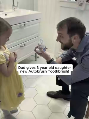 Dad gives 3 year old daughter new Autobrush Toothbrush! #kidstoothbrush #kidsteeth #oralcare #brushingteeth 
