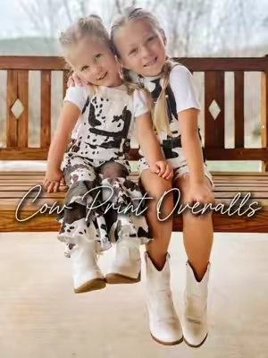 Uh these are so stinking cute!! The short overalls have some stretch to them the long pants don’t have much stretch. They are true to size! #fyp #springtok #rodeo #tiktokshoploveatfirstfind #girlythings #cowprint #kidsoftiktok #kidsclothes #foryourpage #foryoupage @girls jeans 