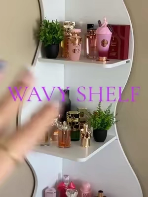 My favorite TikTok purchase 🤌🏻✨😍 #wavyshelf #cornershelf  #perfumeshelf #bookshelf #elevateyourhome #shelfdecor 