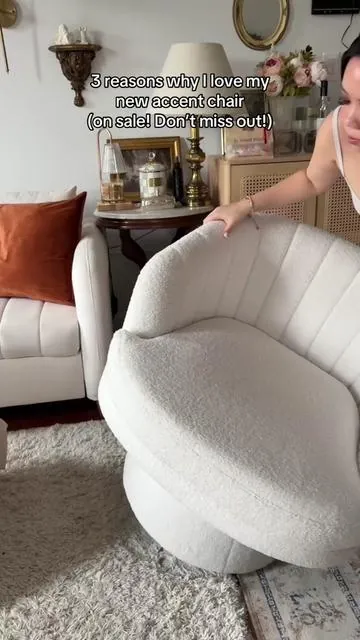 I am obsessed with the timeless and elegant design  of the accent chair I love that  The back of the chair is like a scalloped shell design, and it looks super modern and fits perfectly within my space.  the seat cover is removable and machine washable. It’s wide enough that you can sit crisscross applesauce and you can also rotate 360° currently on sale. I’m not sure when it ends so go and grab it before it’s over!  #ac#accentchairy#nycapartmenty#nychomeu#furniturefindso#homefindsy#nychomedecori#tiktokshoprestocky#nychomedecor