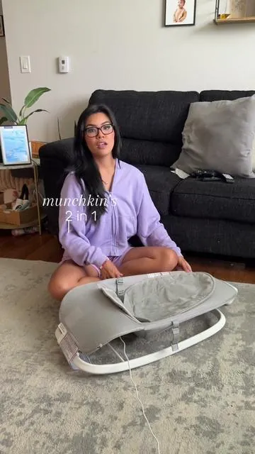 @Munchkin Inc. is on their game bc excuse me?? love their 2 in 1 electric baby bouncer and rocker. so many different positions for chill, play and supervised naps! love that the sound machine aspect has both white noise and lullabies plus a timer!  get yours while it comes with the free premium seat cover gift!!  #munchkin #munchkinelectricbabybouncer #munchkinbouncer #munchkin2in1 #munchkinrocker #babybouncer #electricbabybouncer #electricbouncer #electricrocker  Munchkin 2 in 1 electric baby bouncer and rocker Munchkin electric baby bouncer 