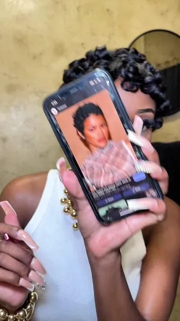 i love when @Jimmy Neutch wears that soft pixie cut curled looked!  she has a great facial structure for short hair so i was nervous about how this would look on me gurl but i actually ended up reallyyy liking it!  i literally didn’t do much but pulled side burns down. i think i will trying combing out the curls a little in the back the next time i wear it to see how that looks too.  #pixiecut #showrealhair #teyanataylor #shortcuts #pixiecutwig 