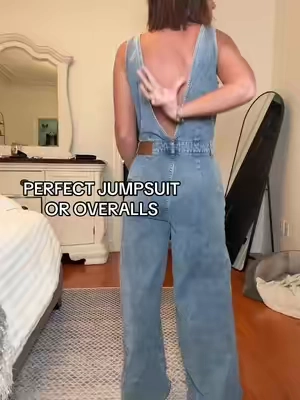 The perfect jumpsuit does exist. Wide leg denim, high quality. Looks great with no shirt, tank, Tshirt, anything! Hugs curves and is so flattering. Wearing a small plus a 3" boot (5'3 size 4) #denimjumpsuit #overalls #bluejeans #fallfashion #countryconcertoutfit 