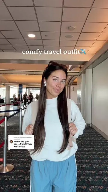 Replying to @ShelbeyAlmeida Comfy airport ootd🩵 love these bow parachute pants dupe!! #airportoutfit #travelootd #parachutepants #tiktokshopoutfit #lookforless 