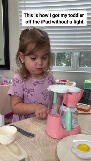 I got tired of the daily iPad battles, so I tried something new… and it WORKED. This kitchen play set keeps her busy for so long! She makes me coffee, pops the toast, mixes pretend batter, sets the table and serves breakfast. She’s learning independence, creativity and real-life skills without even realizing it! #toddlertoys #toddlerlearning #screensfreetoddlers #montessoriathome #parentingtips