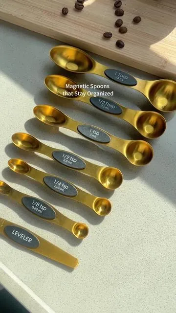 Dual-end design fits liquids and spices, and they stay organized with strong magnets.🌟📏 #cookwareset #toolloversmusthave #cookinggadgets #kitchengadgetgoals #stainlesssteelmixingbowls #bakingtools #usefulkitchenproducts #kitchesessentials #musthavekitchengadgets #standmixeraccessories #tiktokmademebuyit #dealsforyoudays #fyp #foryoupage #measurementtool #measuringcups #measuringspoon #measuringstuff #kitchenhacks #kitchengadgets #kitchenremodel
