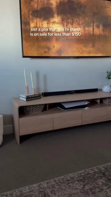 It’s actually INSANE how affordable this tv stand is. It’s GORGEOUS and such good quality!! #tvstand #modernfurniture #tiktokshopcreatorpicks #tiktokshophomefinds #modernhomefinds 