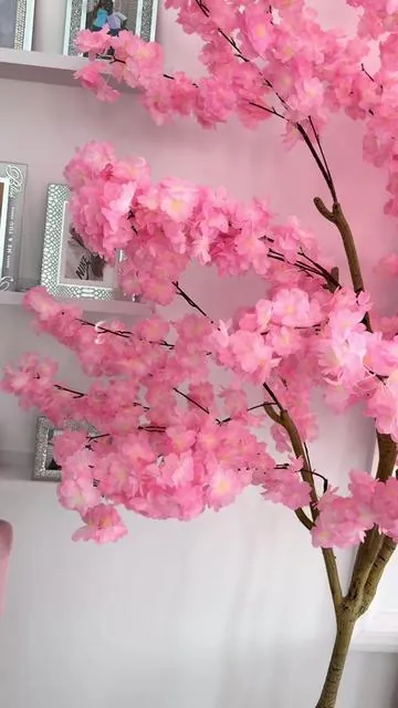 This Faux Cherry Blossom Tree is so beautiful. It has a weighted base and it also comes with moss. This is the Eight Foot option. #fauxtree #cherryblossom #pink #pinktree #tiktokshopcreatorpicks 
