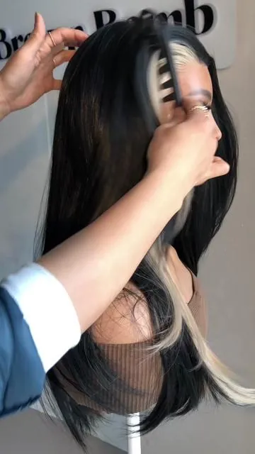 Skunk stripe wig. It’s not just black hair. It’s black with personality. #skunkhair #skunk #skunkstripe🦨 #gluelesswigs #layeredhair 