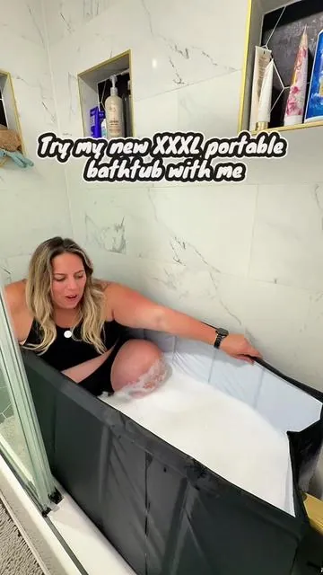 I might have mentioned how excited I am about this 5 times in this video, but the joy of being able to soak in a tub and having the water actually cover my body is everything to me!!  This is the XXXL portable bathtub and it fits my standard (very shallow) bathtub PERFECTLY!!!  This is the perfect option if you have a shallow bathtub like me, or if you only have a shower stall. It would also be great for outdoor use as well because it is very sturdy and durable.  It’s insulated and the water stayed hot, and it was easy to drain with the multiple drains in the tub.  Grab yours from the link on this post. It is going to bring you so much joy if you love soaking in baths like I do! 🧡 #portablebath #portablebathtub #bathtubextender #popupbathtub 