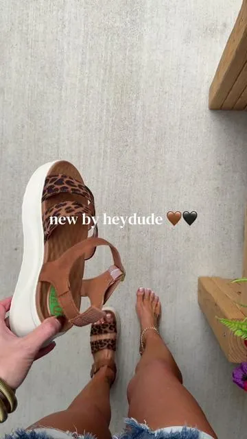 These are not your average platform shoe. Beyond comfy and so dang cute!  @HeyDude #tiktokshopspringglowup #heydudeshoes #platformsandals #comfysandals #leopardprint 