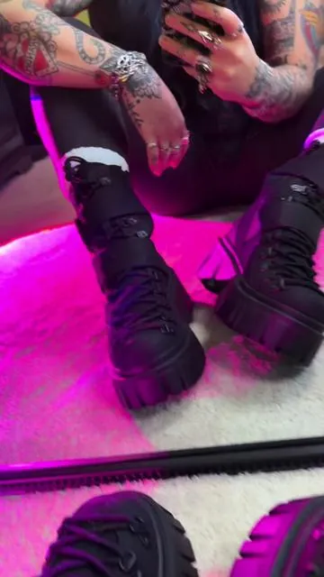 Need a boot upgrade? @Dolls Kill really did their thing with these stunners. The details are incredible. 🖤⛓️ • The Low Traitor Boots are made with twill and vegan leather and the quality is so nice! I may or may not have gotten them in white too. 🫣 • #altboots #gothboots #alttiktok #gothtok #tiktokcreatorpicks