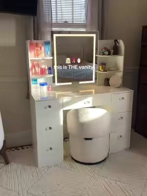 The prettiest vanity ever! So so much storage! #vanity #vanitymirror 