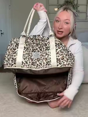 Not only is this cute but look how much stuff it can fit! #weekenderbag #travelbag #dufflebag #carryonbag 