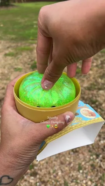 Bypassed all the in-store chaos and got my baby the cutest glitter dumpling from TikTok shop! He is obsessed 💚🥟✨ @JOYIN   JOYIN Dumpling Squishy Toy, Glitter Dumpling Mystery Box, Colorful Dumplings Stress Balls Fidget Sensory Toy, Soft Squeeze Decompression Dough Gift for Adults ##stressball##glitterdumpling##squishy##squishydumplings##sensorytoy