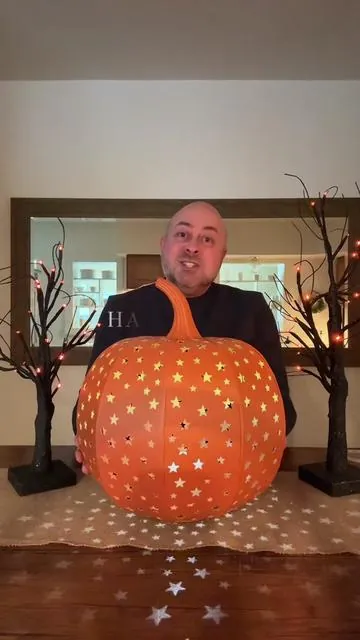 The Illuminated Indoor/Outdoor Metal Stargazer Pumpkin by Martha Stewart is a Halloween Statement Piece! #halloweendecor #codeorange #summerween 