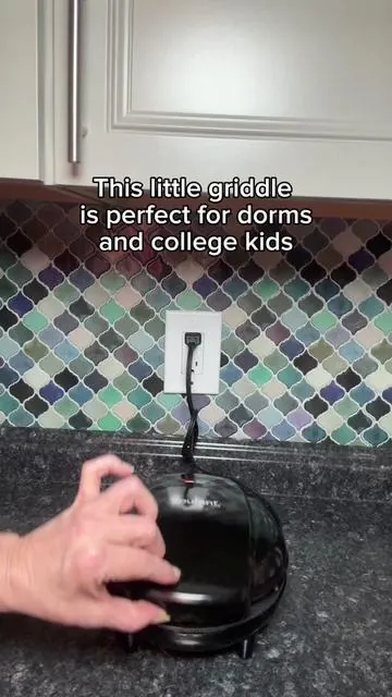 This Courant Griddle and pizza maker is a compact countertop appliance perfect for quick meals like pizza, eggs, and snacks. It heats fast, has a nonstick surface, and makes cleanup super easy. @QVC, Inc  Hashtags: #CourantGriddle #PizzaMaker #QuickMeals #KitchenGadgets #dorm 