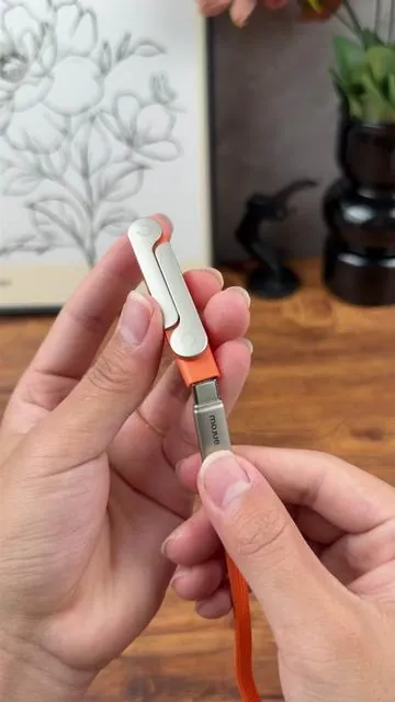 Charge and prop up your phone without needing multiple accessories with this amazing charging cable. ⚡📱 #iPhoneCharger #FIFAWorldCup2026 #PhoneStand #TikTokShop #TikTokShopDealsForYouDays