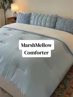 Could literally just stay in bed all day 🤷‍♀️ 🩵 ☁️ #marshmellowcomforter #comforter #mellowsleep #dealsforyoudays 