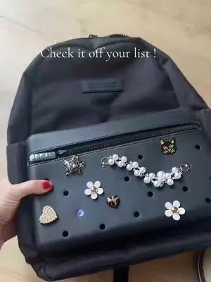 Crocs classic nylon backpack is perfect for back to school. They can create their own style, adding gibbets and change it up! #CrocsBackpack #KidsBackpack #TikTokShopBackToSchool #Backpack 