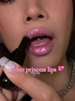 Ready to turn up the sparkle? ✨ Be the main character when you wear our #GlassloadLipMelt in 'Pixel Storm' 👑 #pinkglitter #lipcombo #glitterlips #girlymakeup
