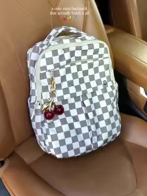 sooo many hidden pockets and compartments! This is the best mom bag hands down. It's mini but holds so much! Not to mention it's so cute 🍒🏁🤍 #mombag  #diaperbag  #dealsforyoudays  #minibackpack  #toddlersoftiktok 