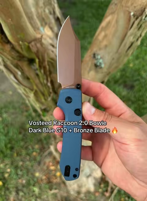 The Vosteed Raccoon 2.0 Bowie pairs a bronze-finished 14C28N blade with dark blue G10 scales for a clean, unique EDC look. It also features a smooth top liner lock, reversible pocket clip, and even includes a storage pouch. #TikTokShop #EDC #PocketKnife #DealsForYouDays #SummerWins