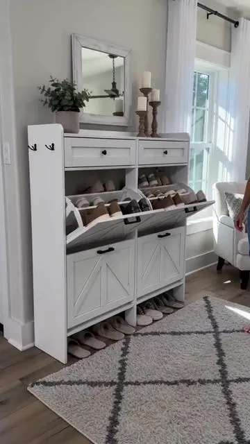 Tired of shoe clutter making your entryway messy? 😩 This rustic farmhouse shoe cabinet is a fantastic solution for stylish organization! Featuring 4 convenient flip drawers for your shoes and 2 extra storage drawers for keys, mail, or other essentials. Its slim design fits perfectly in narrow spaces like your entryway, hallway, or front door. Keep everything tidy and add a touch of charming rustic style to your home. It’s also a thoughtful gift idea! Tap to shop now and elevate your space. #fyp #ShoeCabinet #DealsForYouDays #AIGC #Moras