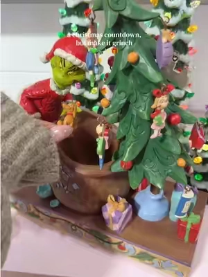 The Jim Shore Grinch Countdown Calendar is basically Christmas decor AND a tradition in one. ✨ #grinch #jimshore #christmascountdown #christmasdecor #holidaydecor