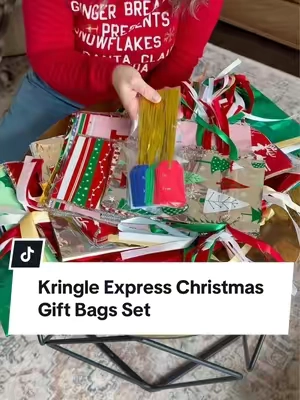 Kringle Express gift bags make Christmas wrapping SO much easier 🎁🎄 50 reusable different sizes + 50 matching gift tags-no wrapping paper, tape or scissors needed. Stock up early for Christmas 2026 because these were SO popular last year! #KringleExpress #ChristmasGiftBags #ChristmasWrapping #GiftWrapping #TikTokshopbacktoschool 