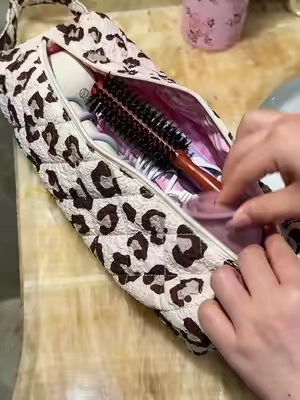 Traveling with hair tools just got so much easier. This padded organizer keeps your dryer, curling iron, attachments, and styling tools neatly stored, easy to grab, and ready to hang in the bathroom. Free shipping is available today, so grab yours while they're still in stock!💗✨ #HairToolOrganizer #TravelEssentials #PackingHacks #HairCareMustHave #TikTokShop