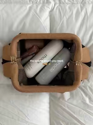 The cutest beauty pouch 🤎✨ #beauty #beautypouch #makeupbag #pinterestinspired #skincare 