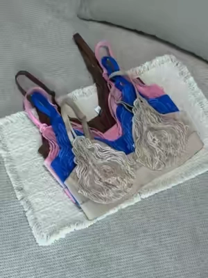 Blue lace folded on a grey afternoon Blue lace on a grey sofa. Some color choices just change the day. #hsiabra #DealsforYouDays #LaceBra #Y