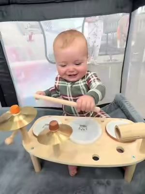 Dakota enjoying her kids drum set! #toddlertoys #musicaltoys #kidsdrumset #sensorytoys #sohochic 