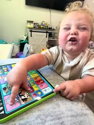 Dakota having fun with her learning tablet! #toddlertoys #educationaltoys #LanguageLearning #babygear #sohochic 