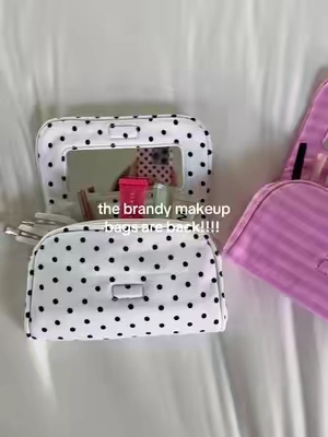 Omg run!! The pink one is back in stock! I will link the polka dot when it restocks! @pacsun #brandymelville #johngalt #makeupbag 