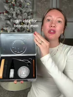 This is such a great gift idea for bearded men. If you are looking at gifts for men with beards, this beard grooming kit comes with beard balm, beard oil, beard brushes, and beard trimmers.  #giftideas #giftsformen #beards #beardedmen #menwithbeards 