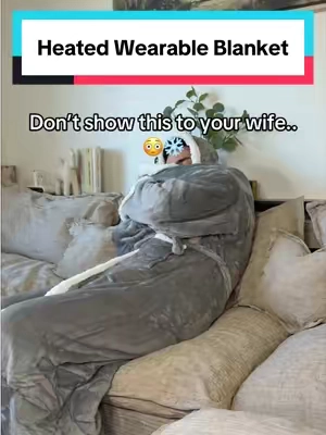 Don’t let your wife see this 😳 it’s the perfect gift #wife #giftforwomen #wearableblanket #heatedblanket #christmasgiftideas 