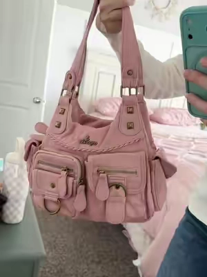 The Y2K hobo bag is back in pink👜✨ This cute slouchy purse has that effortless early-2000s vibe and is perfect for everyday outfits. #Y2KFashion #HoboBag #Y2KStyle #EverydayBag #pursetok 