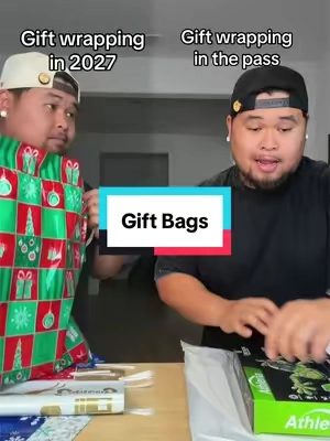 He thought he had the better gift wrappers 🤣 #GiftWrapper #christmaswrapping #christmasbags 